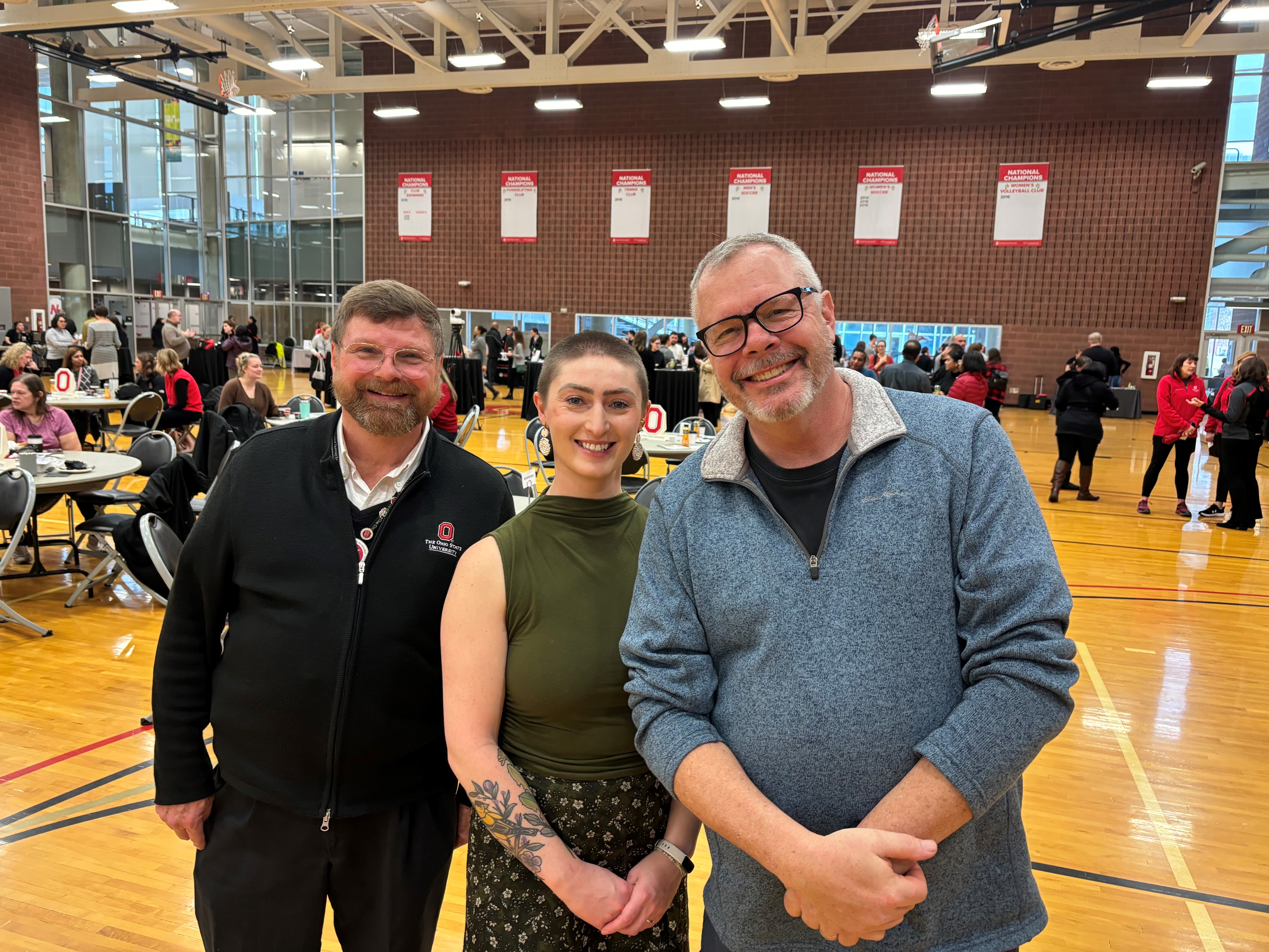 three people together smiling