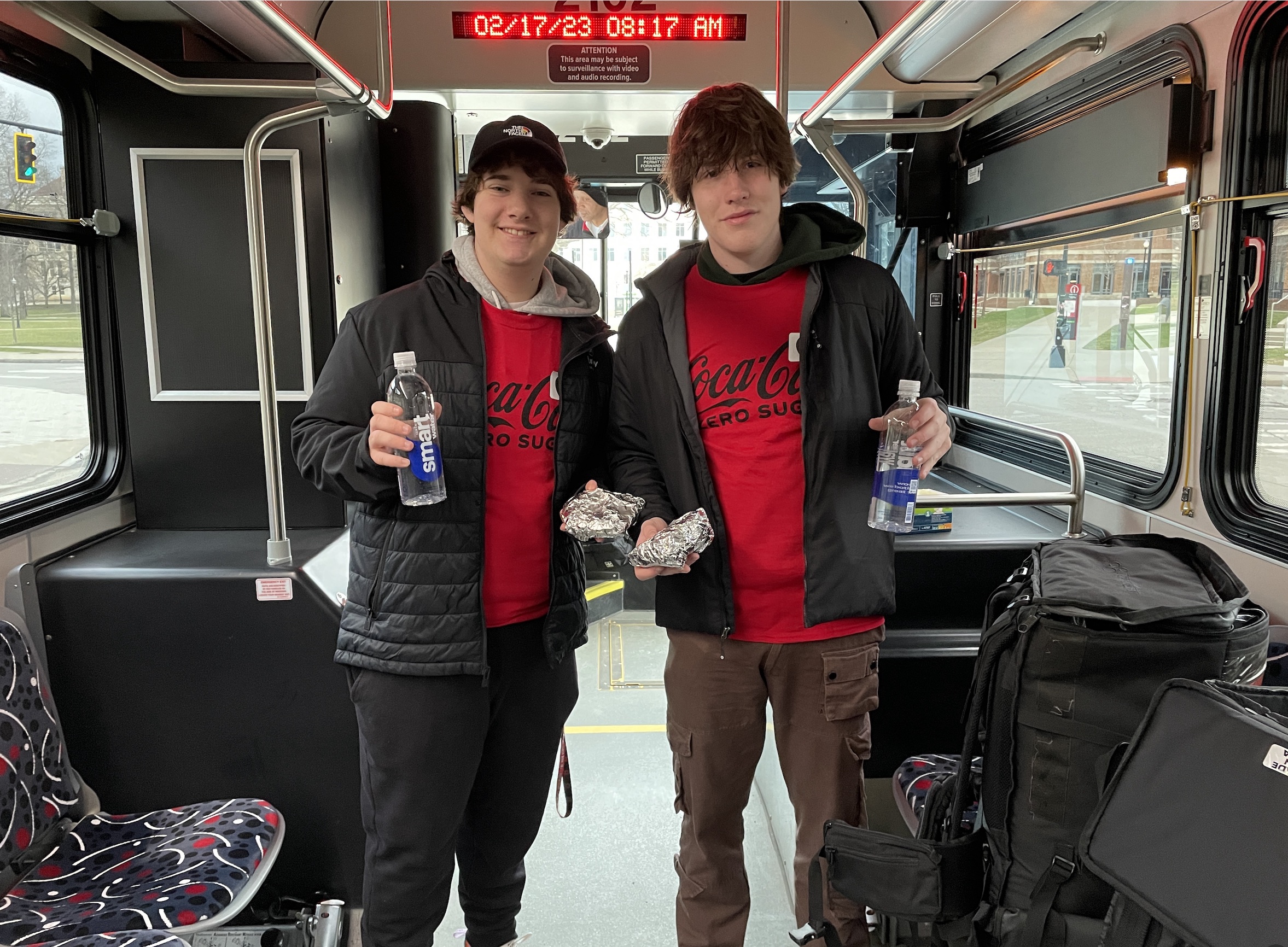 Two people in a CABS bus.